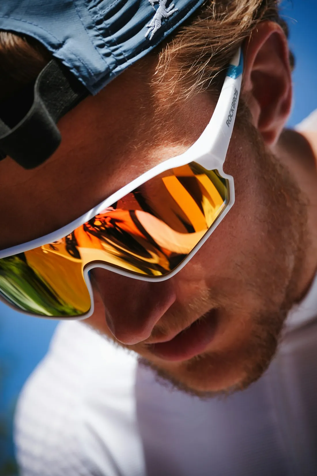 Man wearing modern sport sunglasses