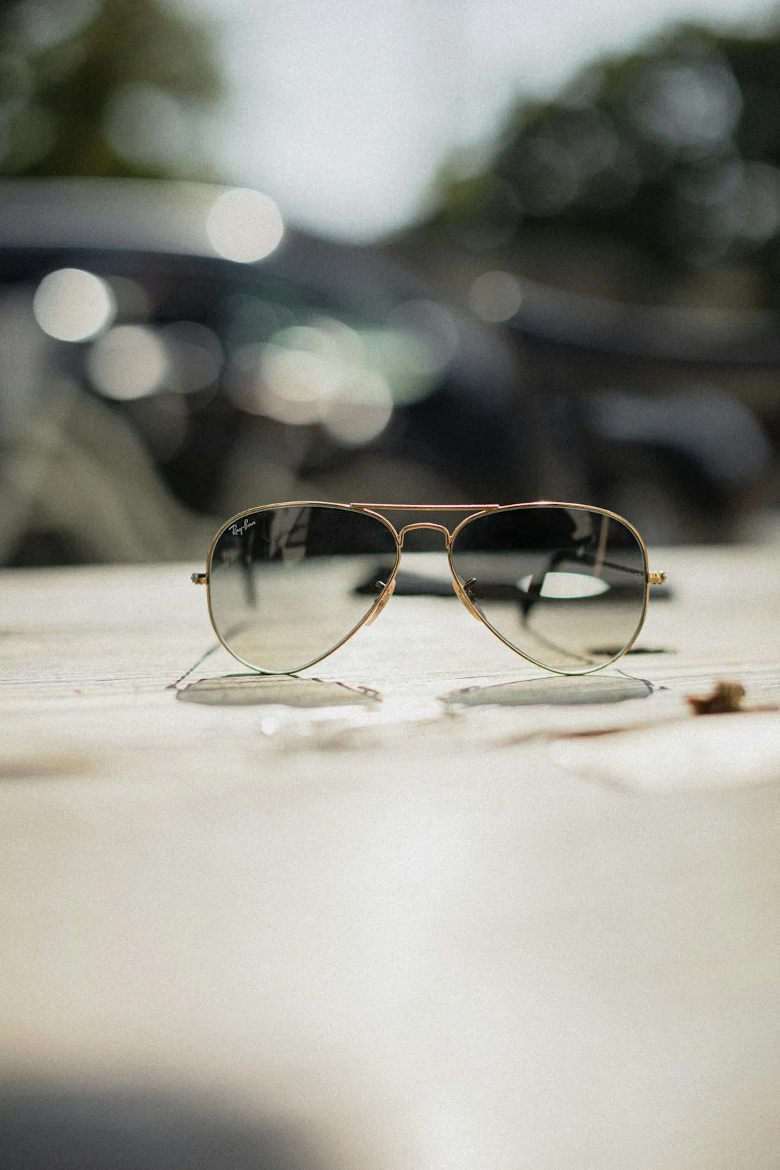 Gold-framed aviator sunglasses